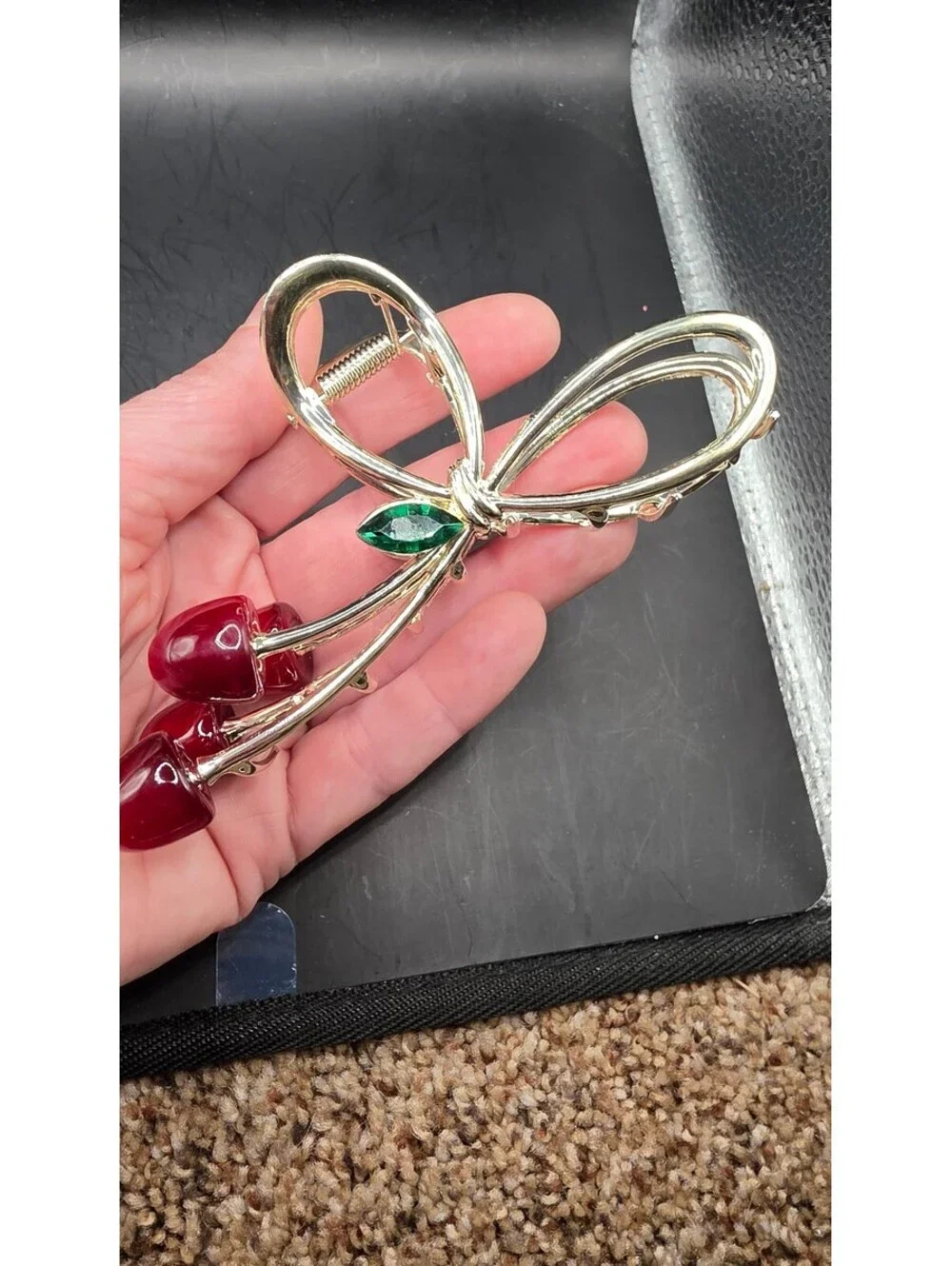Elegant Gold-Tone Cherry Bow Hair Clip with Red Accents and Green Leaf Detail –